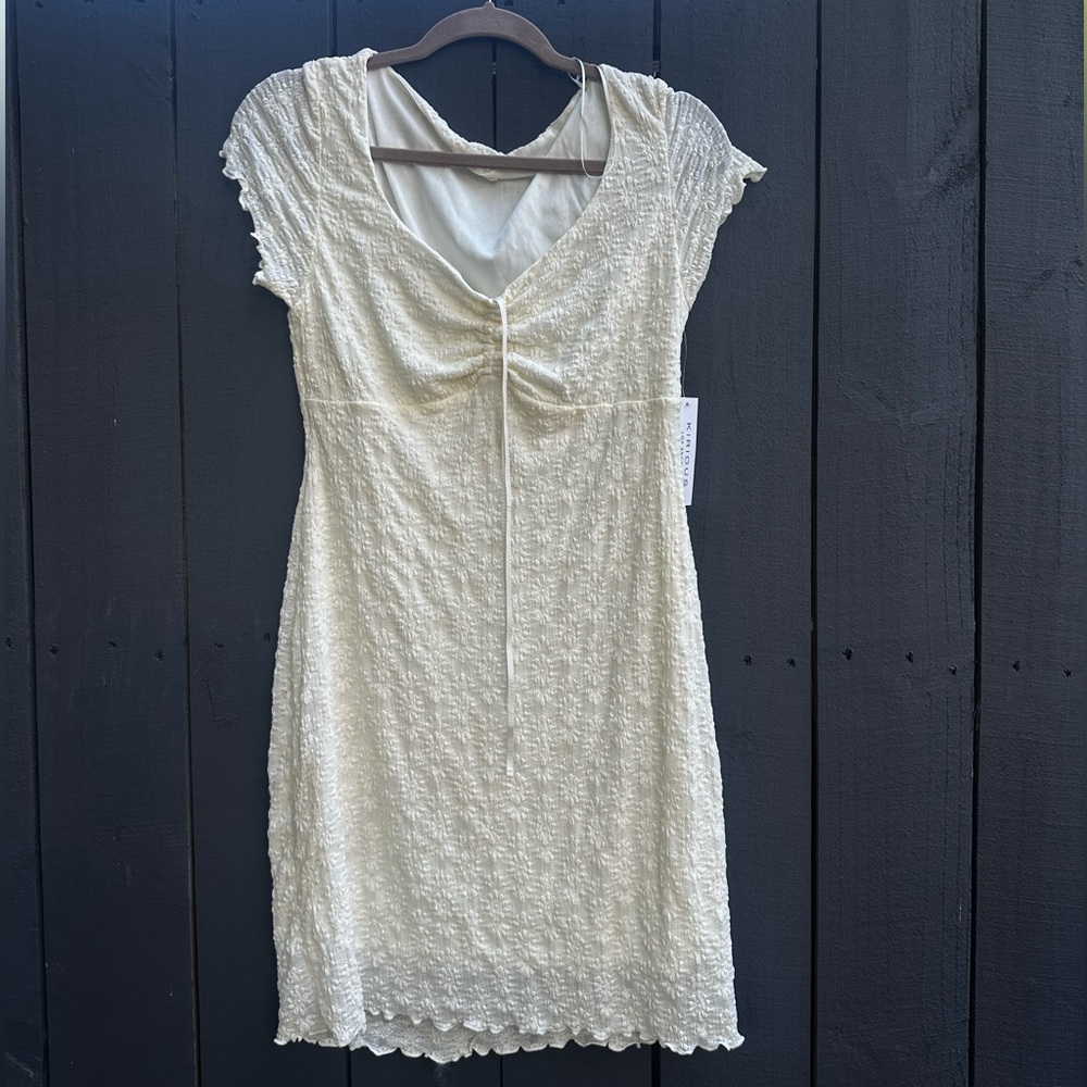 New white dress with tags. Size L